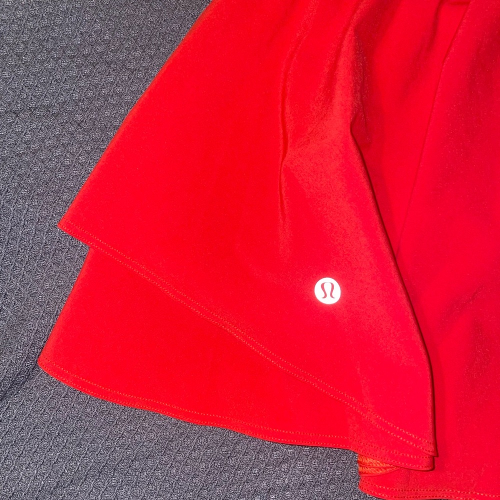 Lululemon Court Rival 14” Skirt in a vibrant Coral color - Picture 5 of 12